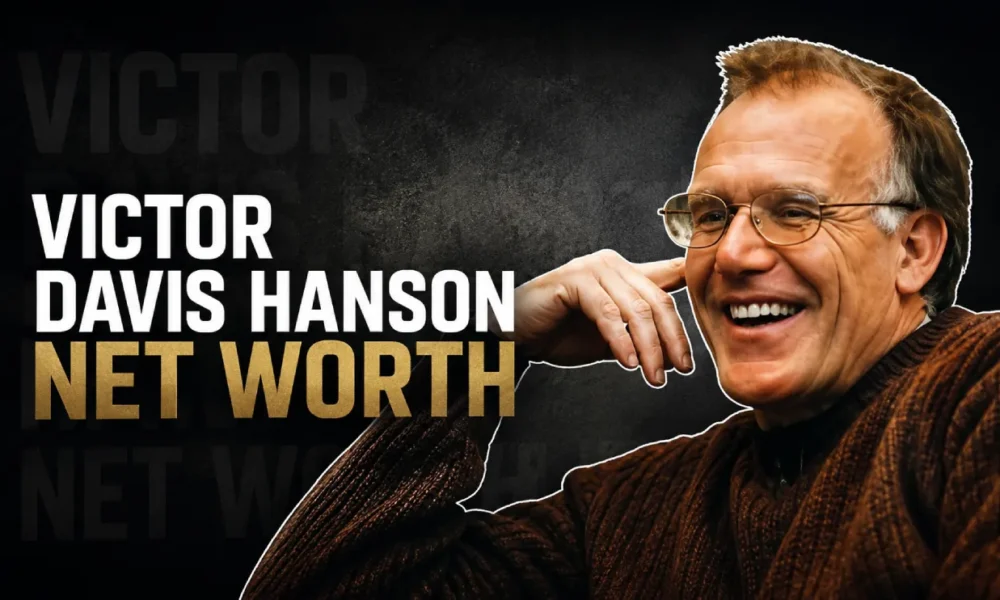 Victor Davis Hanson smiling in a brown sweater