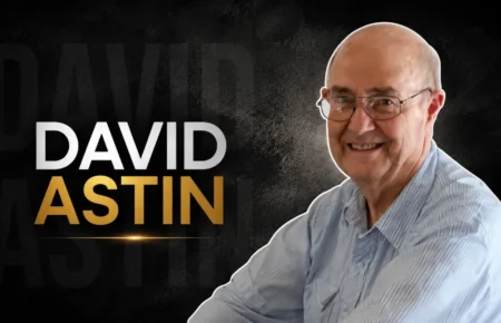David Astin smiling in a casual setting, known for his family background and private life.