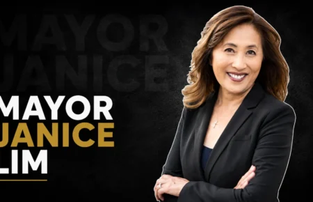 Mayor Janice Lim in a black blazer with folded arms