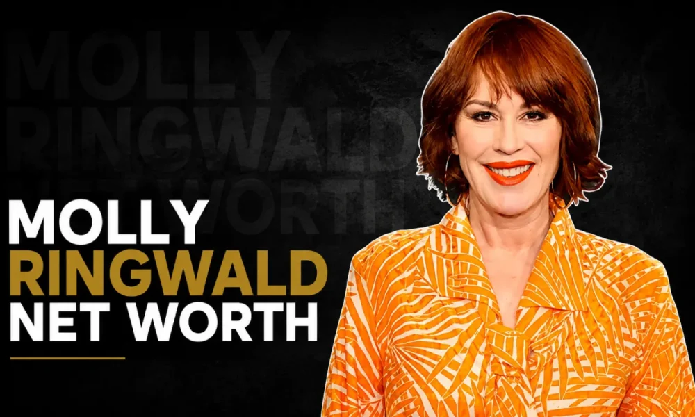 Molly Ringwald wearing an orange patterned blouse