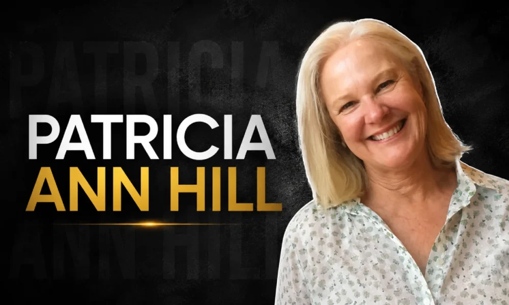 Patricia Ann Hill smiling in a relaxed setting, known as the mother of Lana Del Rey.