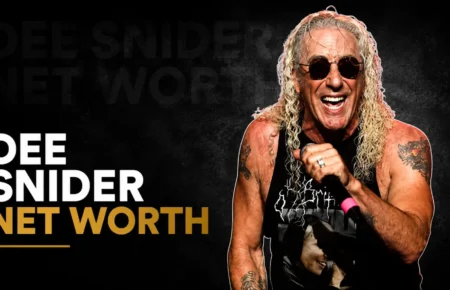 Dee Snider performing on stage with a microphone