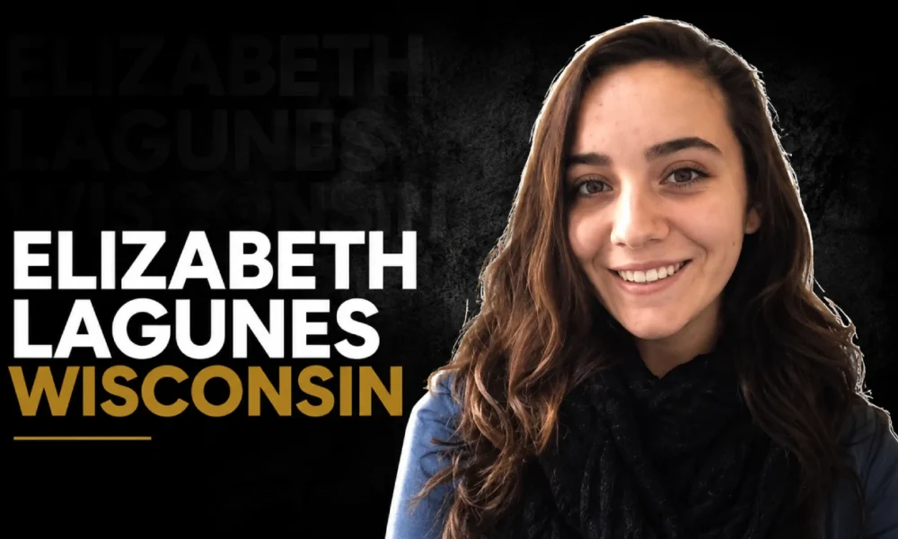 Elizabeth Lagunes smiling with long dark hair