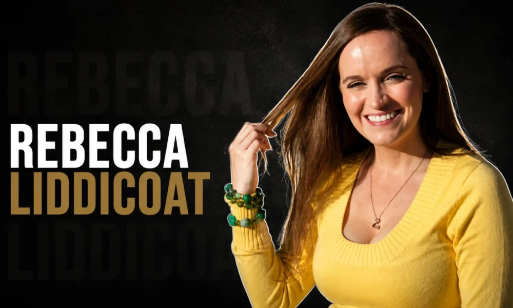 Rebecca Liddicoat smiling in a yellow sweater