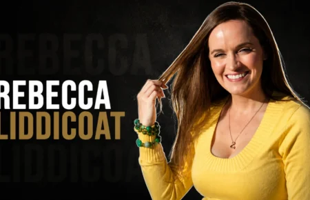Rebecca Liddicoat smiling in a yellow sweater