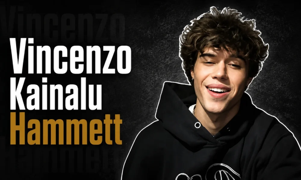Vincenzo Kainalu Hammett, son of musician Kirk Hammett, smiling in a casual black hoodie.