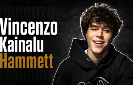 Vincenzo Kainalu Hammett, son of musician Kirk Hammett, smiling in a casual black hoodie.